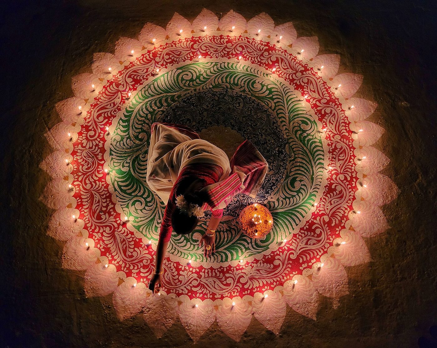 Rows of oil lamps lit for a festival