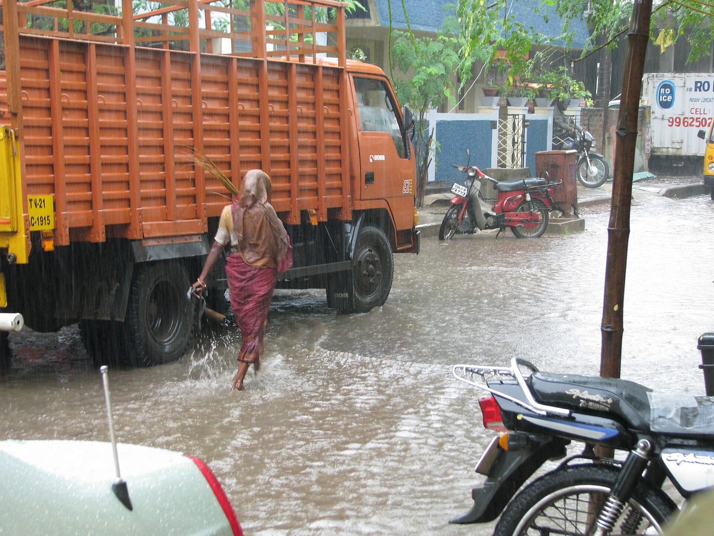 Rain falling hard on a city road during the monsoon